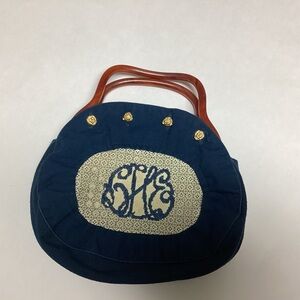 Elegant Blue Handbag with Wooden Handles vintage fabrics